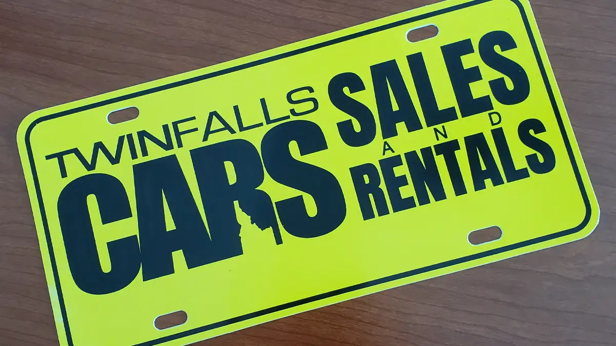 Black and yellow license plate insert for Twin Falls Cars Sales and Rentals
