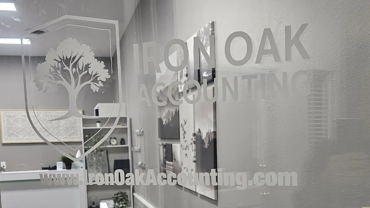Business vinyl window signage logo inside door for Ironoak Accounting