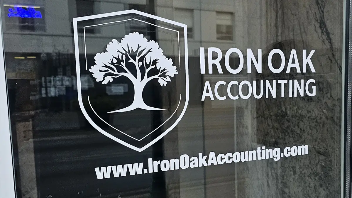 Business vinyl window signage logo outside door for Ironoak Accounting